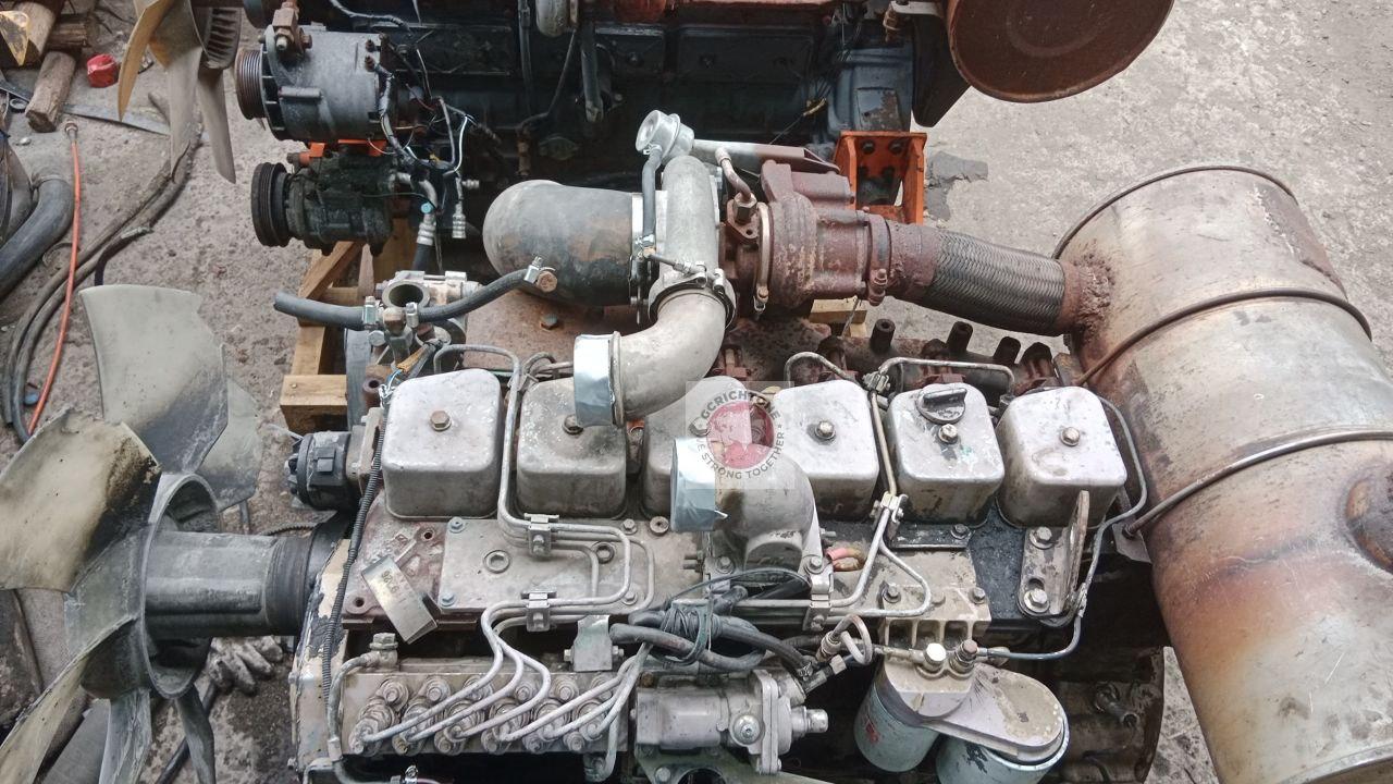 Дизельный двигатель Komatsu S6D102